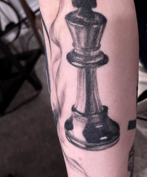 Chess piece tattoo by @effyliutattoo